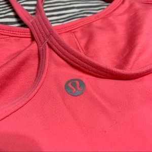 Light pink lululemon work out athletic tank.